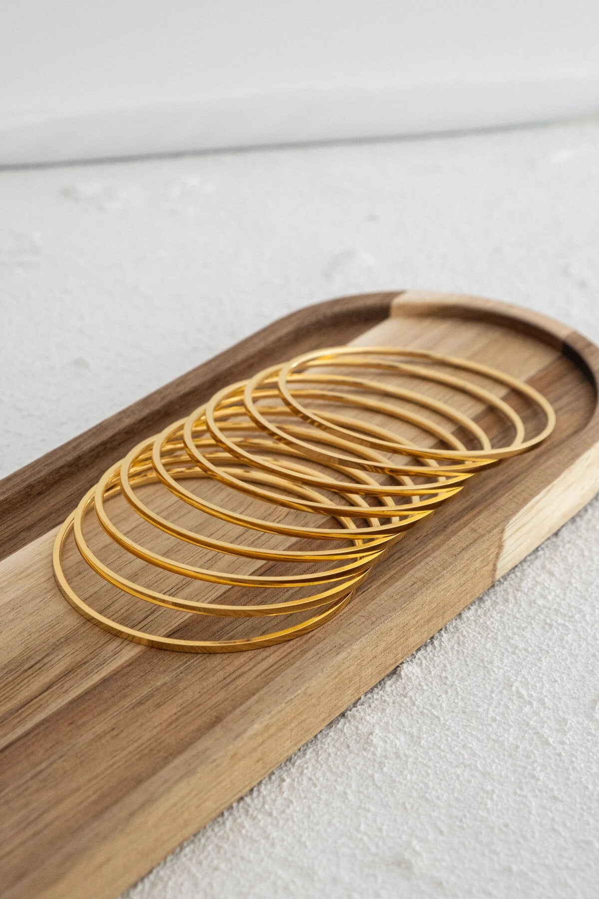 Çelik Ajda Bilezik İnce Kibrit Çöpü Kararmaz Altın 9'lu Set Çap 6.6cm