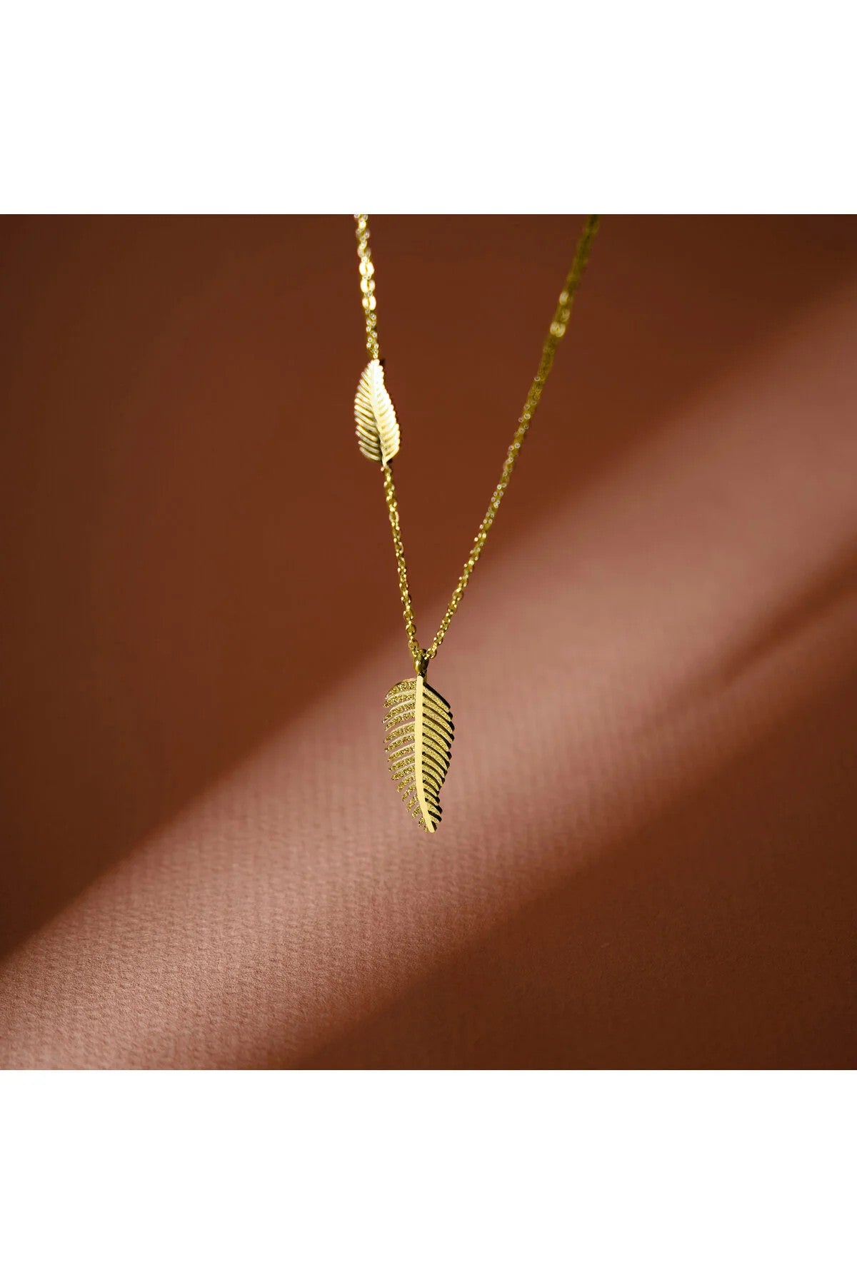 Çelik Tüy Figürlü Kolye Minimal Kuş Tüyü Kararmaz